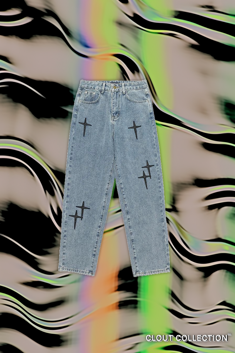 Stylishly Distinct: Explore Our Cross-Adorned Light Wash Denim Jeans