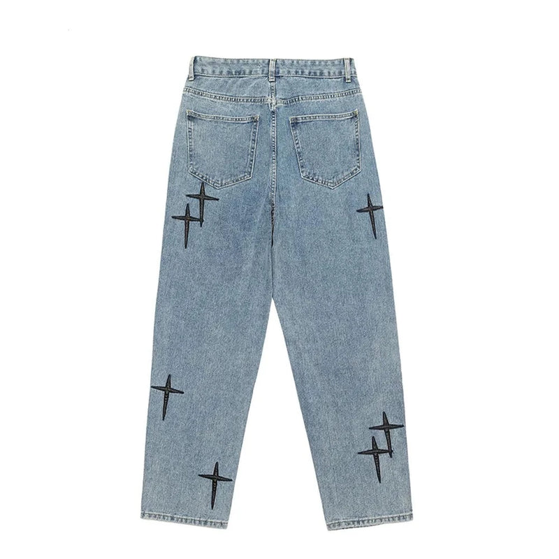 Cross-Adorned Light Wash Denim Jeans