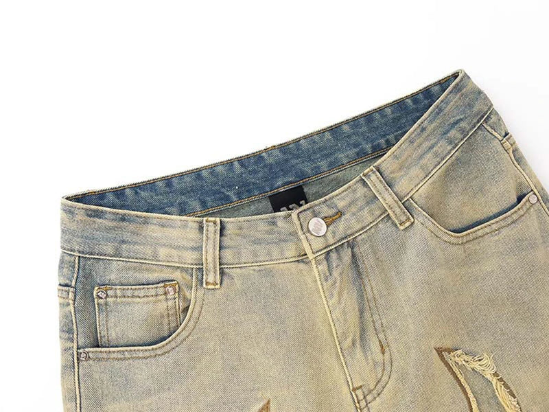 Primal Etch Raw-Edge Distressed Denim Jeans