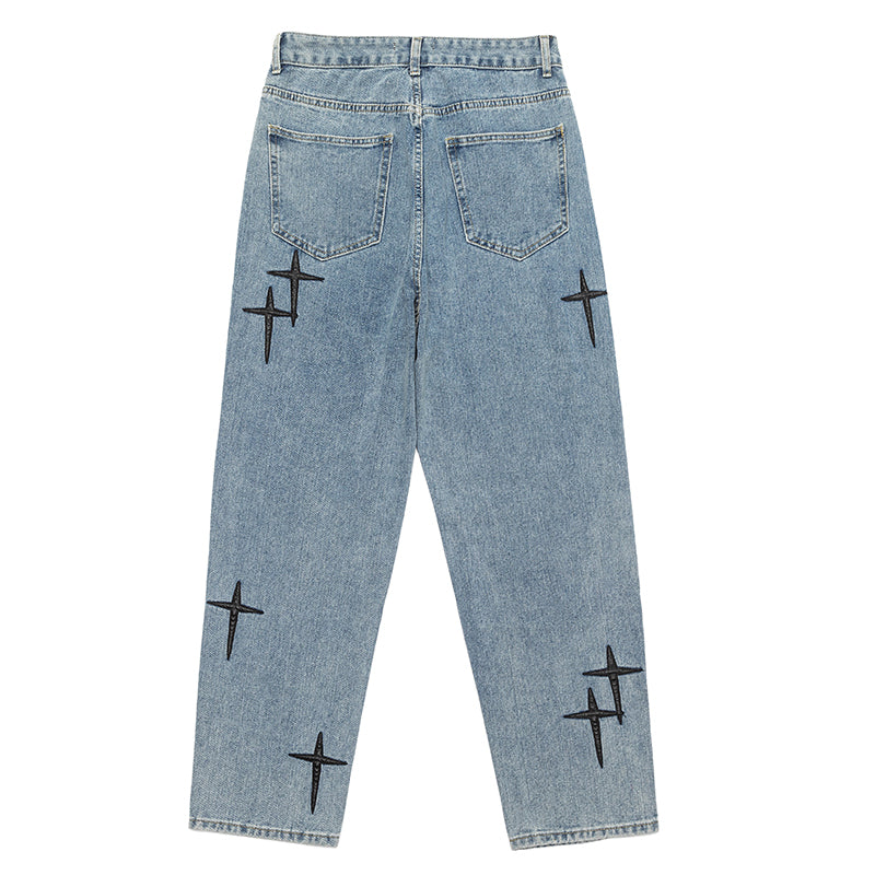 CLOUT COLLECTION ™  Cross-Adorned Light Wash Denim Jeans