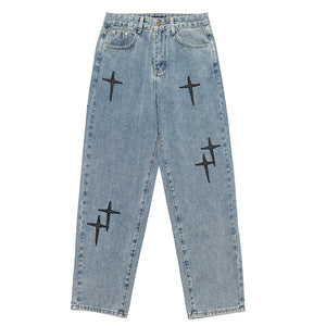 Cross-Adorned Light Wash Denim Jeans