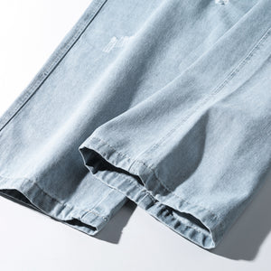 Light Wash Jeans with Heavy Distress - Clout Collection High Fashion Streetwear Men's and Women's